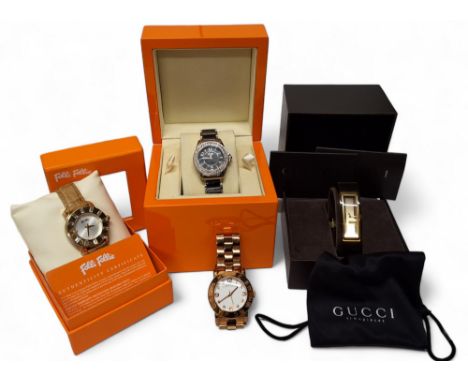 A Gucci lady's bangle watch model no. 2465P, quartz movement (not checked), crack to bangle, box and papers; a Marc Jacobs MB