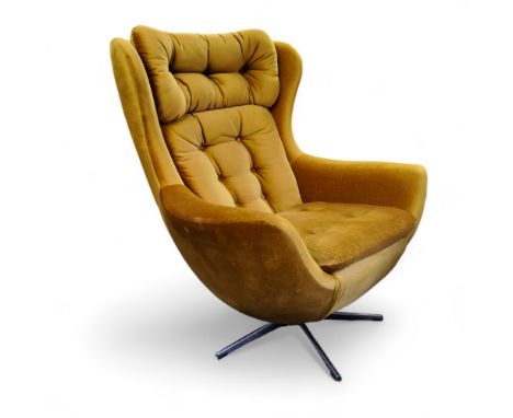 Mid 20th Century Design - a 1970's swivelling wing back egg chair, mustard corduroy upholstery, chrome legs, excellent condit