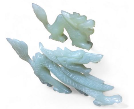 Oriental Works of Art - two Chinese celadon jade cabinet carvings of dragons 