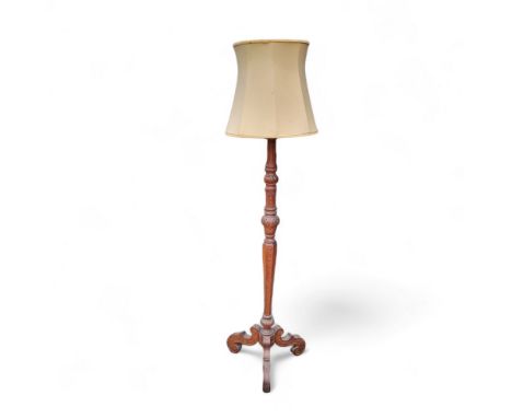 A Victorian style mahogany standard lamp, with shade, approximately 6ft high 