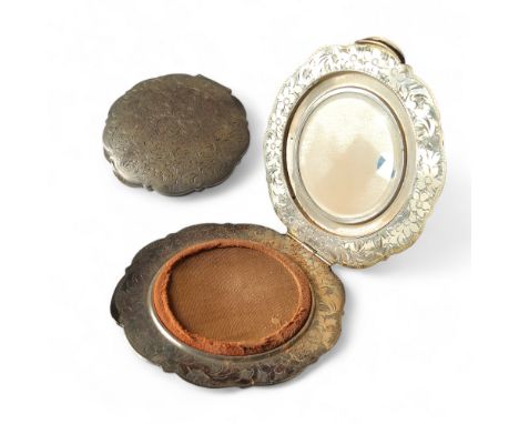 A Continental silver compact by&nbsp;Marek Vonchovsky, hallmarked M.V. stamped 835, decorated with foliate scrolls to one sid