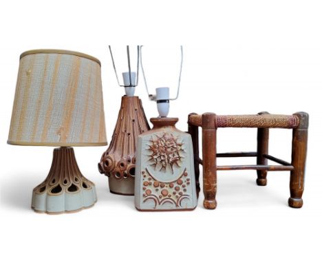 A 20th century 'Quantock' style pottery lamp base, in relief with roundels, arches and star burst, in buff and tan, 25cm high