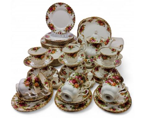 A Royal Albert Old Country Roses dinner and tea service, comprising ten dinner plates, six dessert plates and bowls, ten teac