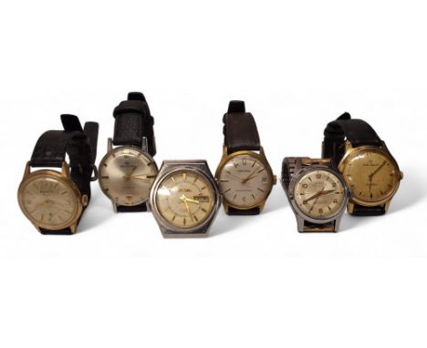 An Orient Crystal Day/Date gentleman's stainless steel wristwatch, 21 Jewel automatic movement, cream dial, gold baton marker