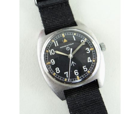 HAMILTON MILITARY ISSUE STAINLESS STEEL WRISTWATCH, c. 1977, circular black dial with broad arrow and Tritium 'T' within a ci