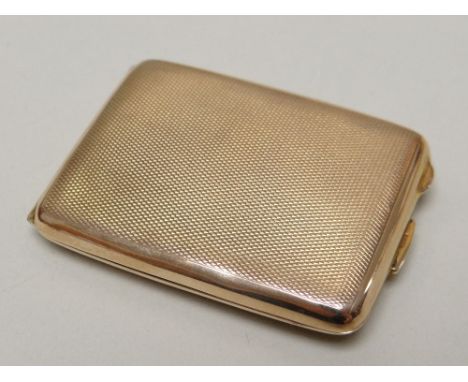 GEORGE V 9CT GOLD MATCH BOOK CASE of rectangular form, engine turned, Birmingham 1925, engraved initials inside, 29.1gms Prov