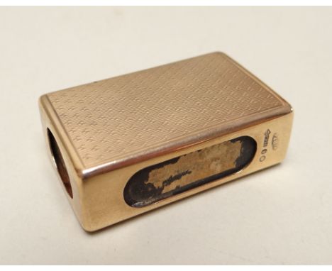 GEORGE V 9CT GOLD MATCH BOX HOLDER of rectangular form, engine turned, housing a vintage 'Bryant &amp; May's' matchbox, Londo