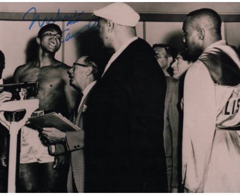 ALI MUHAMMAD: (1942-2016) American Boxer, World Heavyweight Champion. Signed 10 x 8 photograph of Ali standing in a three qua