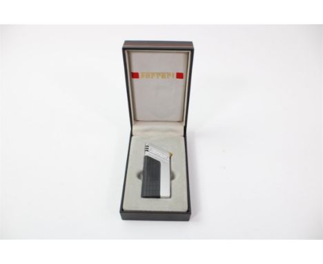 Manufactured in period by Cartier, and presented in very good condition in the original box. Offered at No Reserve.1980s Ferr