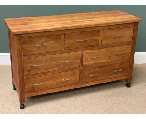 MODERN LIGHT WOOD MULTI- DRAWER CHEST on castors, 79cms H, 132cms W, 46cms D