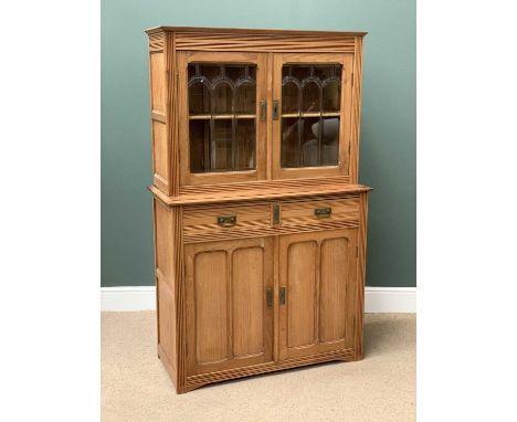 20th CENTURY LIGHT OAK BOOKCASE CUPBOARD, the upper section with twin bevelled glass doors over a two drawer and two fielded 