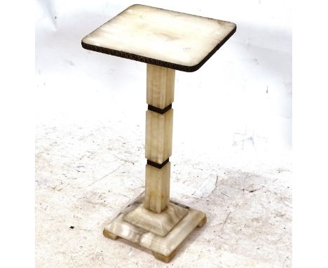 An Art Deco alabaster lamp table, with brass mounts, W31cm, H64cm 