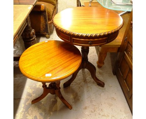 A reproduction hardwood drum table, on tripod base, and a circular mahogany lamp table (2) 
