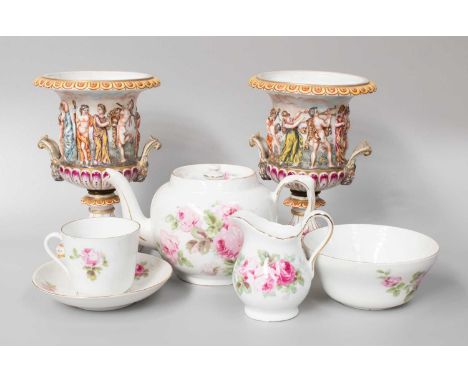 A Pair of Capodimonte Style Porcelain Campana Urns, together with a porcelain teaset (qty)