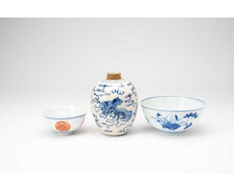 A CHINESE BLUE AND WHITE 'FLOWERS' BOWL, A 'PHOENIX' MEDALLION BOWL AND A VASEKANGXI AND LATERThe larger bowl painted with lo