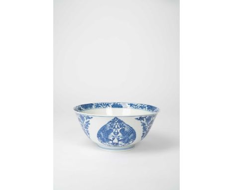 A CHINESE BLUE AND WHITE 'MARRIAGE' BOWLKANGXI 1662-1722The exterior painted with three teardrop-shaped panels of two facing 