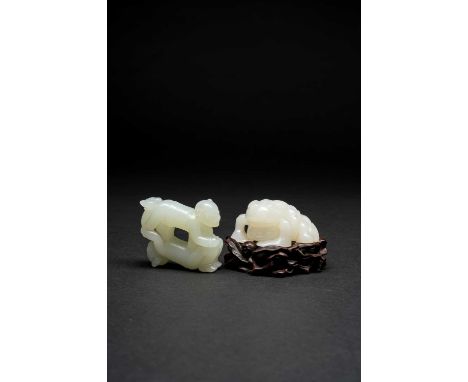 A CHINESE WHITE JADE CARVING OF A TOAD AND A JADE CARVING OF THE TWIN BOYS, 'SIXI TONGZHI'QING DYNASTY OR LATERThe toad on a 