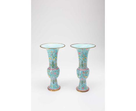 A PAIR OF CHINESE CANTON ENAMEL GU-SHAPED VASES QING DYNASTY OR LATERBrightly painted with yellow and blue bats amidst colour