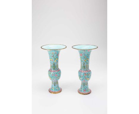 A PAIR OF CHINESE CANTON ENAMEL GU-SHAPED VASES QING DYNASTY OR LATERBrightly painted with yellow and blue bats amidst colour