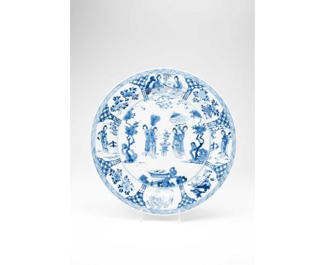 A LARGE CHINESE BLUE AND WHITE 'LADIES' DISHSIX CHARACTER KANGXI MARK OF THE PERIOD 1662-1722The centre painted with two ladi