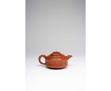 A CHINESE YIXING CALLIGRAPHIC TEAPOT AND COVERREPUBLIC PERIODThe compressed quatrefoil body finely incised with a poem signed