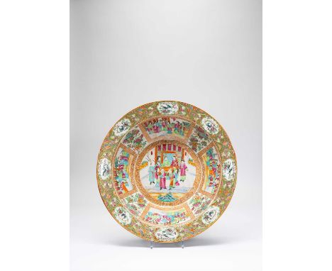 A LARGE CHINESE CANTON FAMILLE ROSE BASIN19TH CENTURYDecorated with panels of flowers, and with smaller panels of song birds,