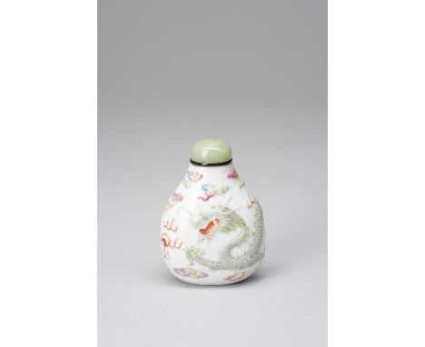 A RARE CHINESE FAMILLE ROSE MOULDED SNUFF BOTTLEC.1853-64The pear-shaped body decorated with a dragon chasing a flaming pearl