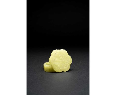 A SMALL CHINESE YELLOW JADE PETAL-SHAPED BOX AND COVERQING DYNASTY OR LATERThe cover carved with a small figure in a sampan, 