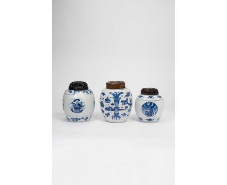 THREE CHINESE BLUE AND WHITE OVOID VASESKANGXI 1662-1722Two moulded with ribs, variously decorated with flowers, antiques, bi