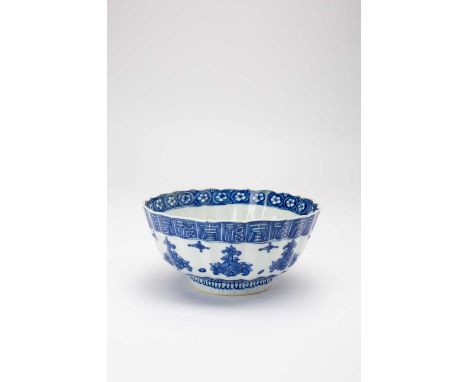 A CHINESE BLUE AND WHITE MOULDED 'FU SHOU' BOWL KANGXI 1662-1722The interior with a peach and shou character medallion, the e