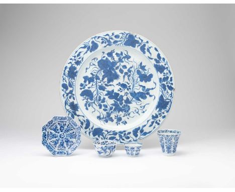 FIVE CHINESE BLUE AND WHITE ITEMSKANGXI 1662-1722Comprising: a large dish painted with flowers and leaves, an octagonal cup a