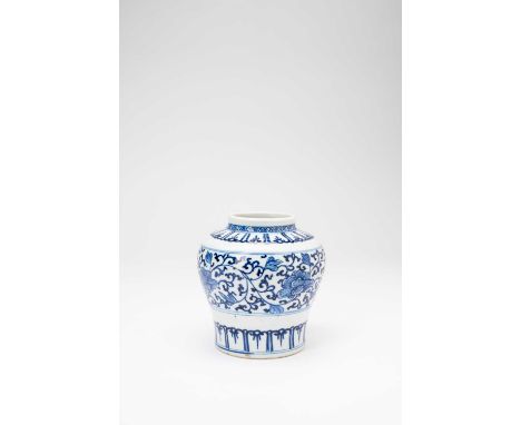 A CHINESE BLUE AND WHITE 'TIAN' JARKANGXI 1662-1722The squat baluster body painted with a wide band of a peony on an undulati