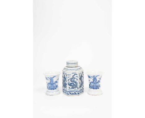A PAIR OF CHINESE BLUE AND WHITE BRUSHPOTS AND A TEA JAR AND COVER19TH AND 20TH CENTURYThe brushpots with flared cylindrical 