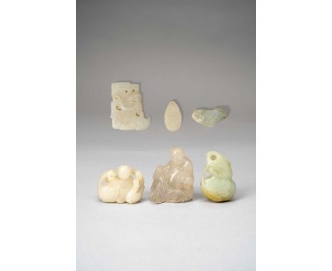 FIVE CHINESE JADE CARVINGS AND A ROCK CRYSTAL CARVINGQING DYNASTYComprising: a gourd-shaped pendant, 5.4cm, a pendant formed 