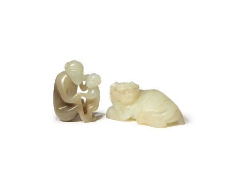 TWO CHINESE CELADON JADE ANIMAL CARVINGSQING DYNASTYOne formed as a seated monkey with its infant, with a large russet area i