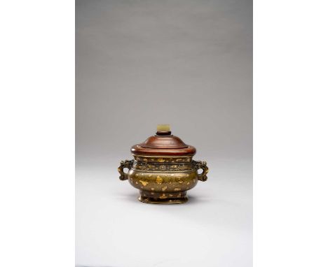 A SMALL CHINESE GOLD-SPLASHED INCENSE BURNER17TH/18TH CENTURYThe rounded rectangular body cast with a band of dragons divided