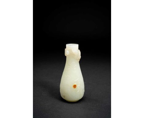 A SMALL CHINESE PALE CELADON JADE VASEQING DYNASTY OR LATERThe slender pear-shaped body carved with a single scaly dragon cha