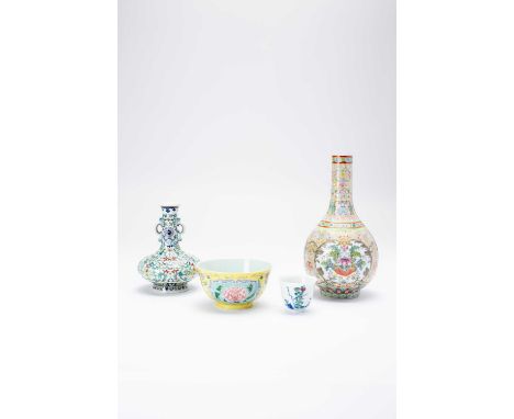 FOUR CHINESE PORCELAIN ITEMSMODERNComprising: a famille rose bottle vase, a doucai vase, a yellow ground peony bowl, and a mo