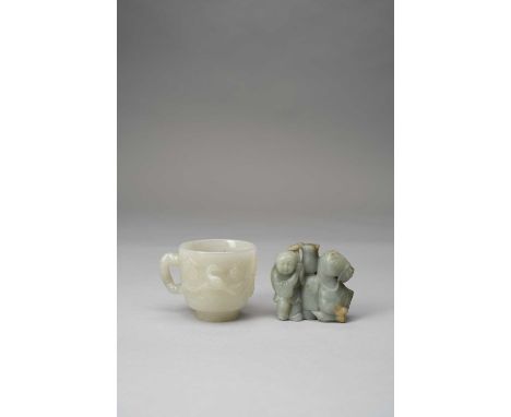 A CHINESE JADE 'PRUNUS' CUP AND A JADE FIGURE OF A HORSE AND A BOYQING DYNASTYThe cup with a prunus branch handle and two bir