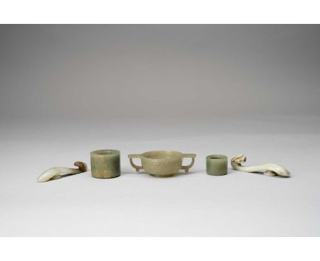  *** PLEASE NOTE THE RESERVE HAS INCREASED TO £800 *** FIVE SMALL CHINESE JADE ITEMSQING DYNASTYComprising: a two-handled cup