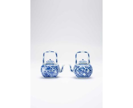 A PAIR OF SMALL CHINESE BLUE AND WHITE EWERS AND COVERSKANGXI 1662-1772The rounded rectangular bodies painted with quatrefoil