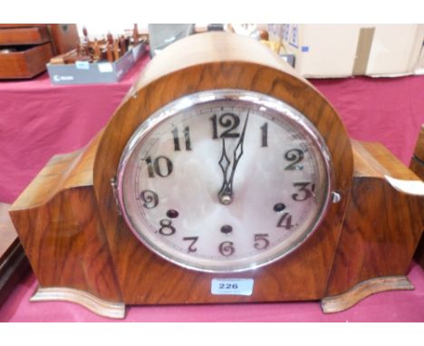 A 1940s walnut mantle clock with three train movement. 9¼' high