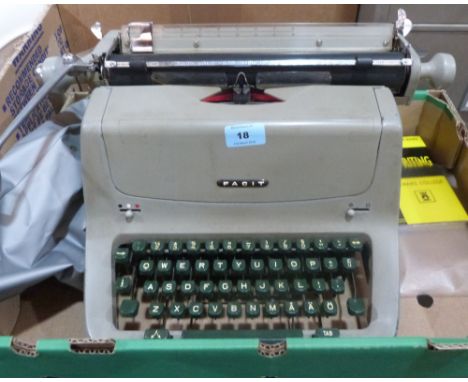 A Facit typewriter with Pitman's manual