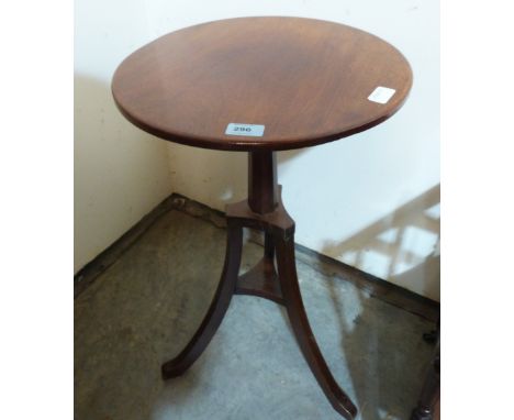 A mahogany lamp table on splayed tripod support