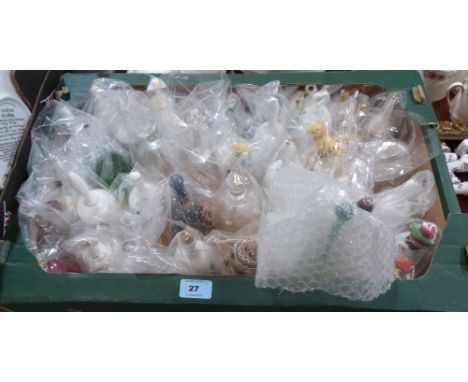A collection of ceramic and glass decorative bells