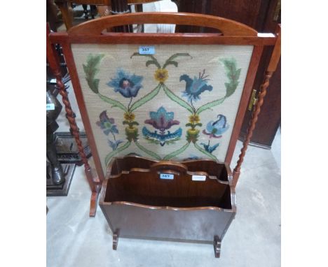 A tapestry firescreen and a magazine rack