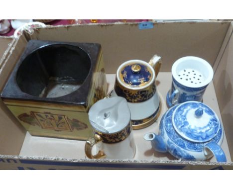 A Cauldon blue and white teapot, a Bretby jardiniere and other ceramics