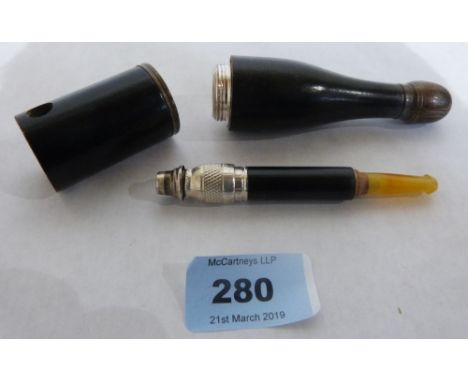 A novelty tobacco pipe in the form of a champagne bottle, inscribed Franco - British Exhibition London 1908. 5½' high