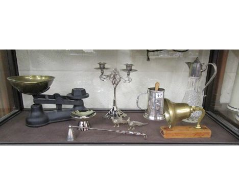 Shelf of collectables to include scales, claret jug &amp; bell etc