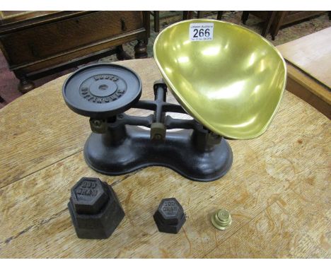 Set of vintage scales with weights marked Boots Nottingham